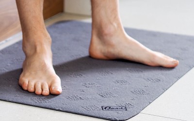 Person standing on Conni Floor Mat